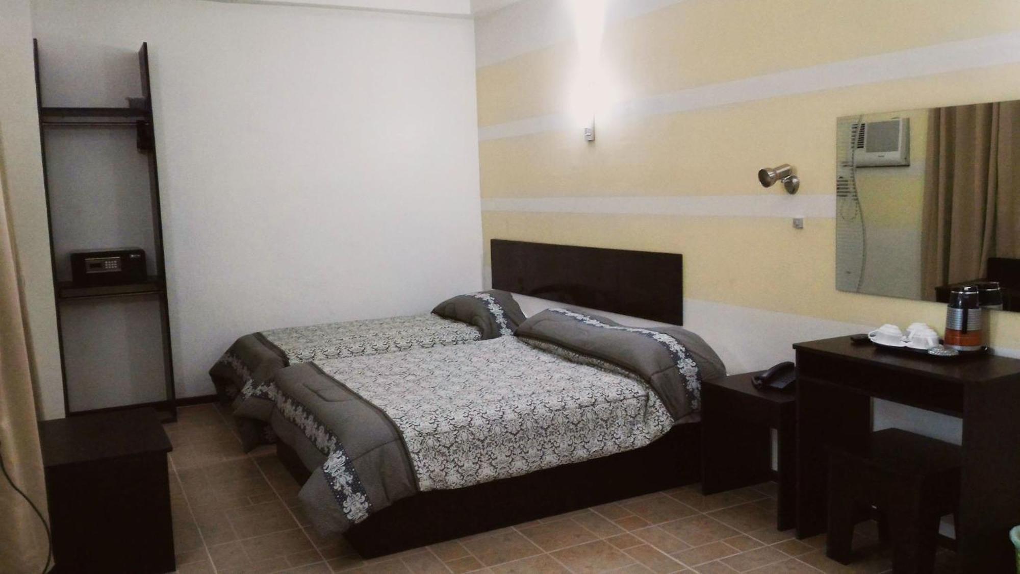 Metro Park Hotel Mandaue Cebú Habitación foto