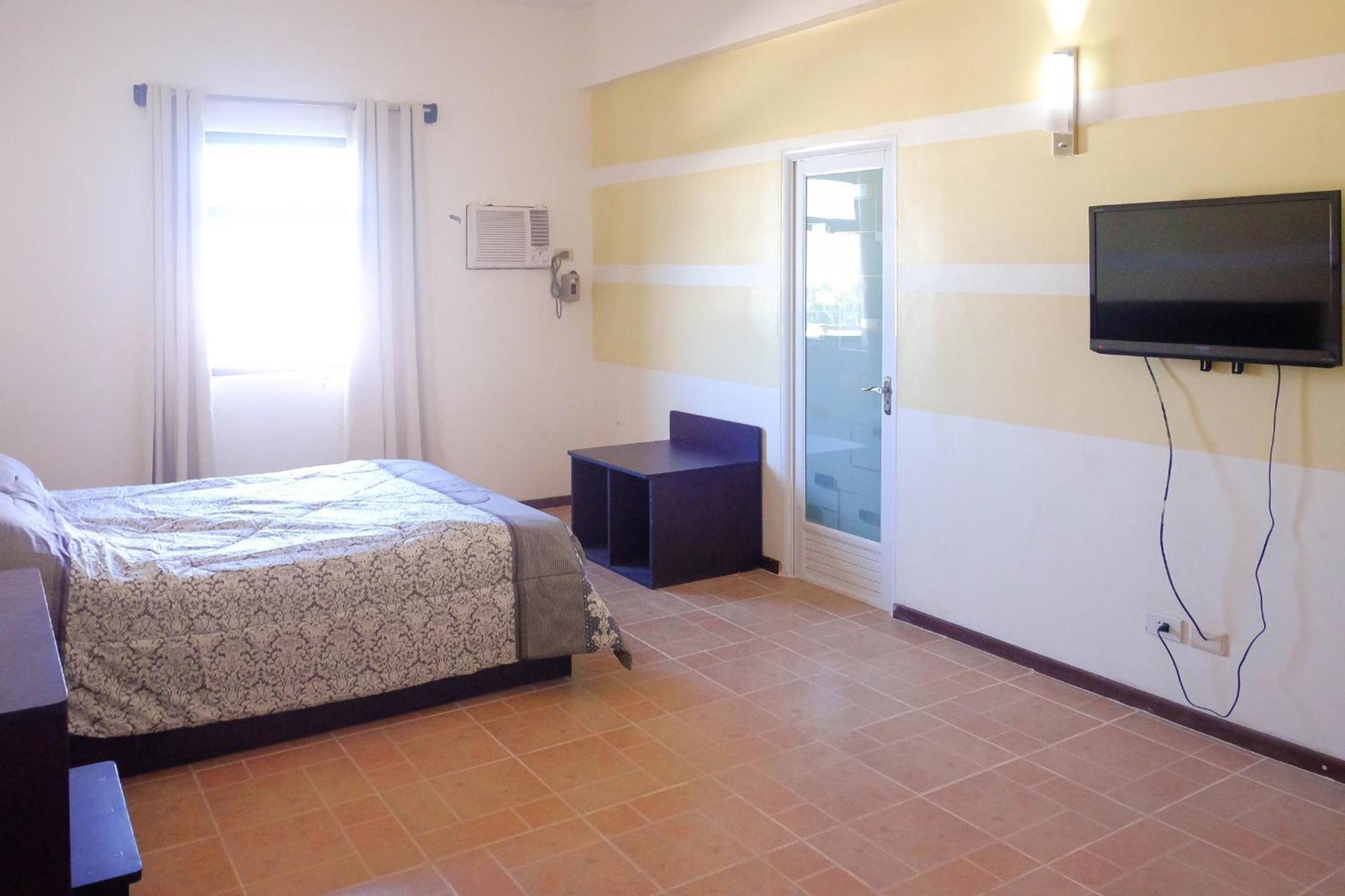 Metro Park Hotel Mandaue Cebú Habitación foto